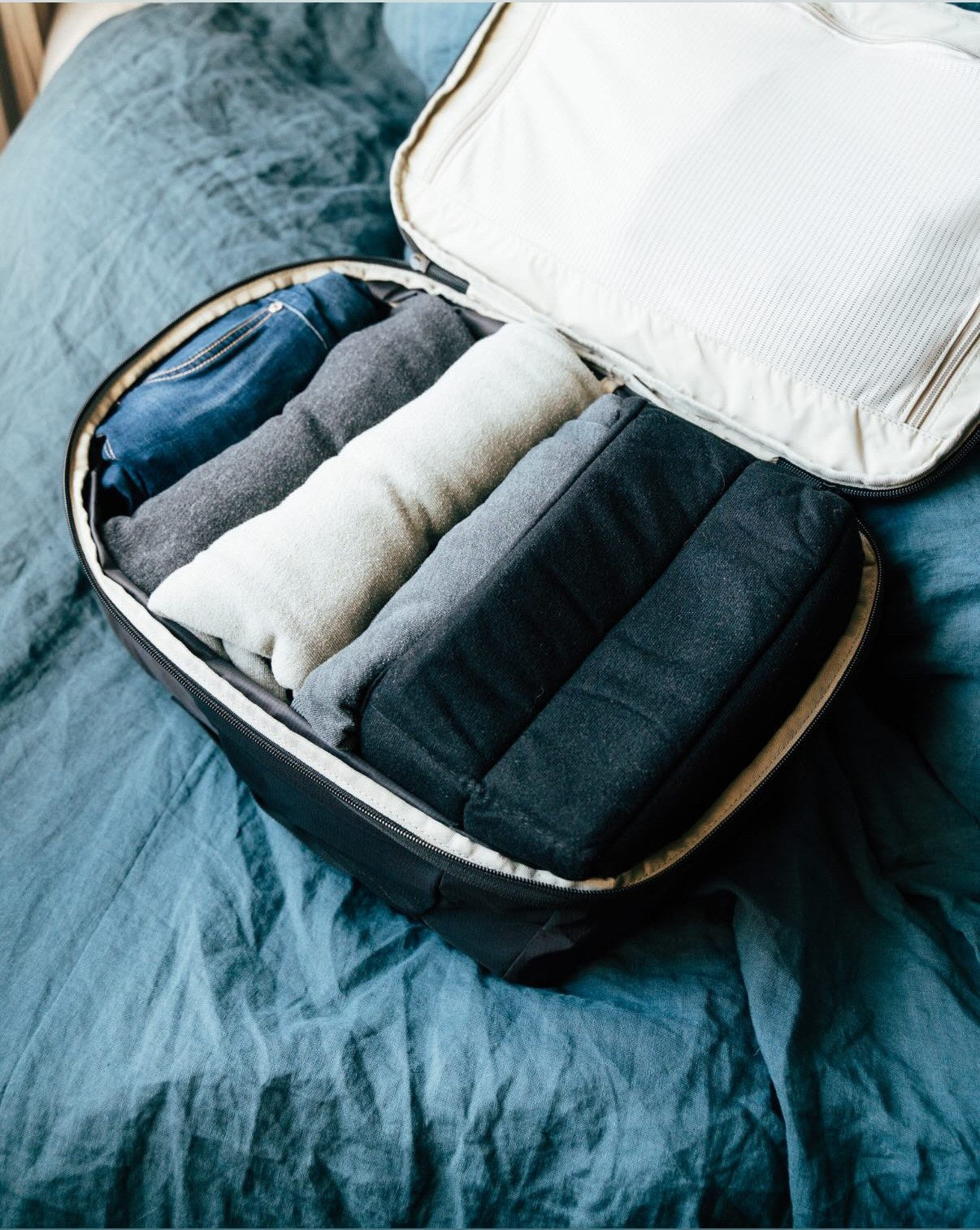 Almond Oak backpack opened like a suitcase